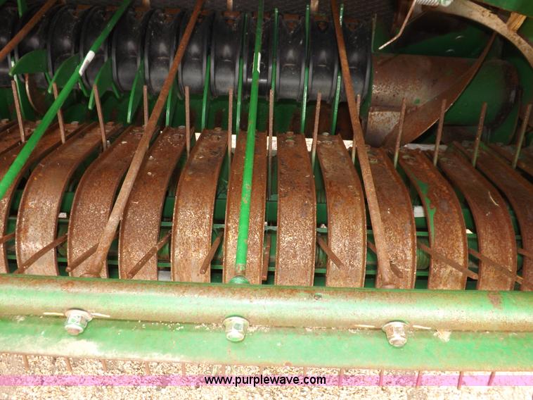 image for item H7111 2008 John Deere 568 round baler