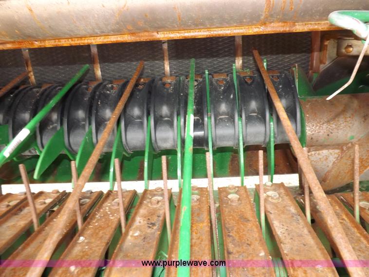 image for item H7111 2008 John Deere 568 round baler