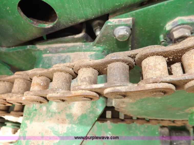 image for item H7111 2008 John Deere 568 round baler