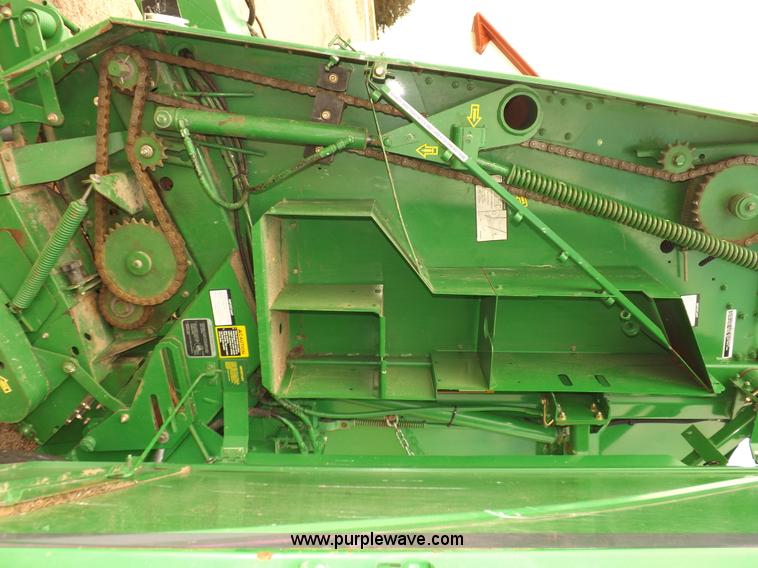 image for item H7111 2008 John Deere 568 round baler