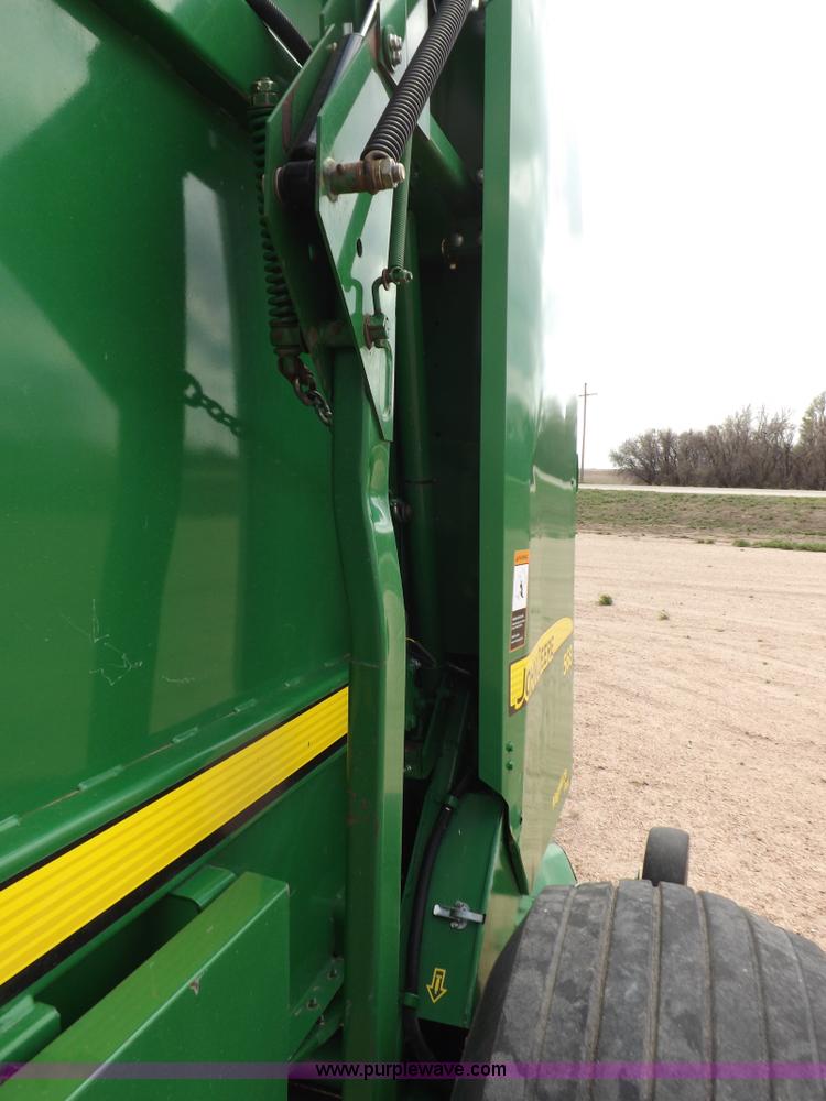 image for item H7111 2008 John Deere 568 round baler