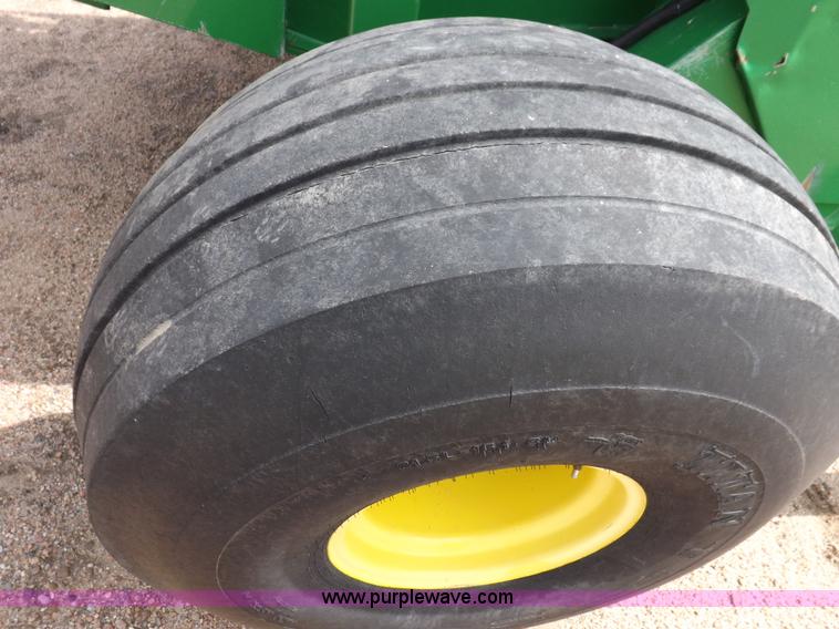 image for item H7111 2008 John Deere 568 round baler