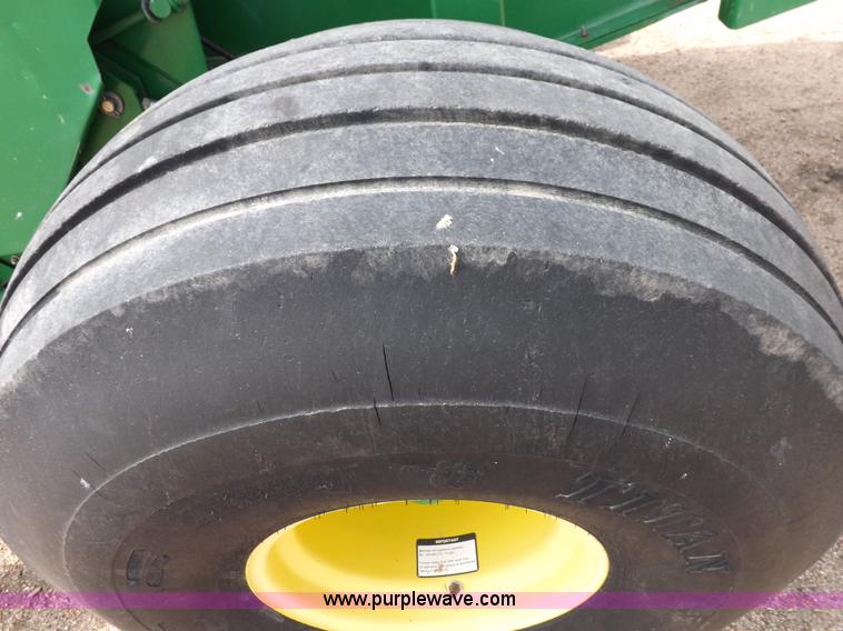 image for item H7111 2008 John Deere 568 round baler