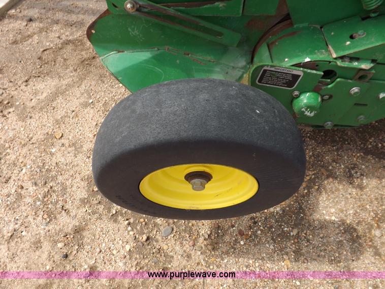 image for item H7111 2008 John Deere 568 round baler