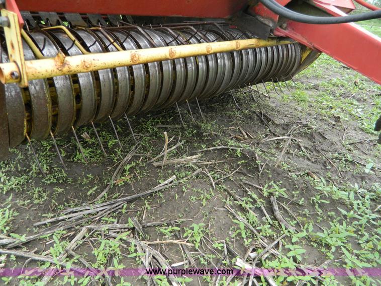 image for item W9012 New Holland 850 round baler