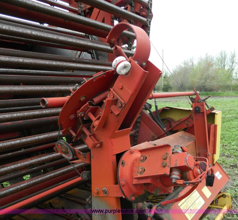 image for item W9012 New Holland 850 round baler