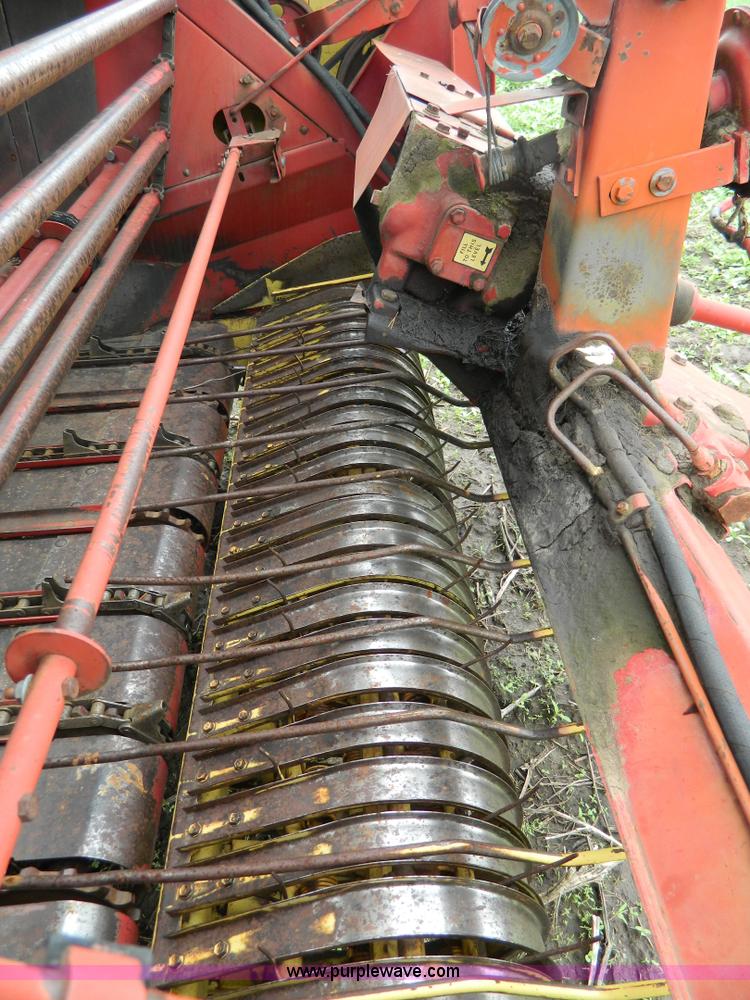 image for item W9012 New Holland 850 round baler