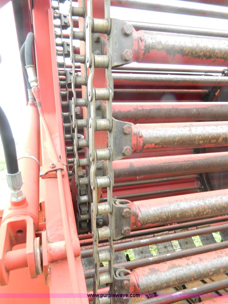 image for item W9012 New Holland 850 round baler