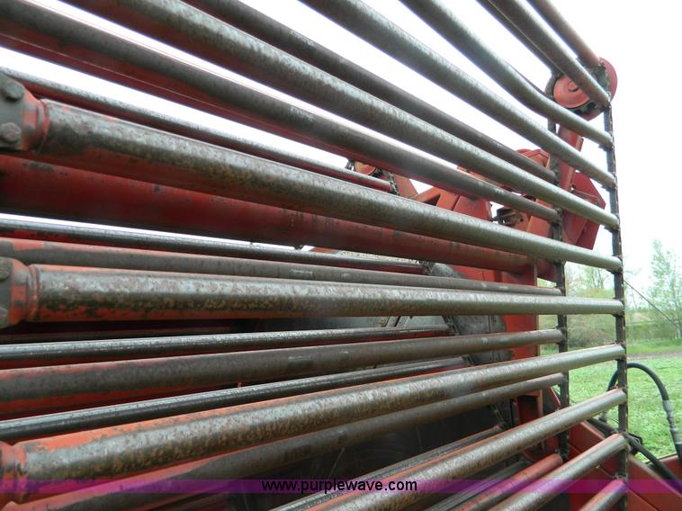 image for item W9012 New Holland 850 round baler