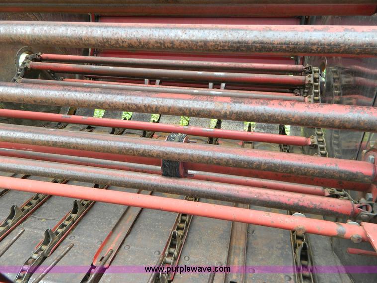 image for item W9012 New Holland 850 round baler