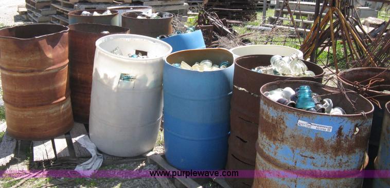 image for item AG9788 (12.5) drums of vintage glass insulators