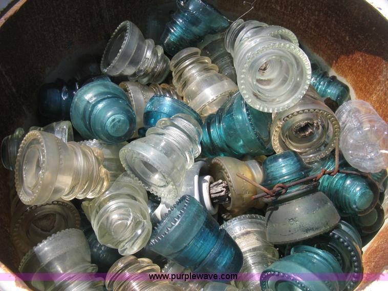 image for item AG9788 (12.5) drums of vintage glass insulators
