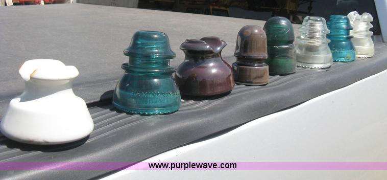 image for item AG9788 (12.5) drums of vintage glass insulators