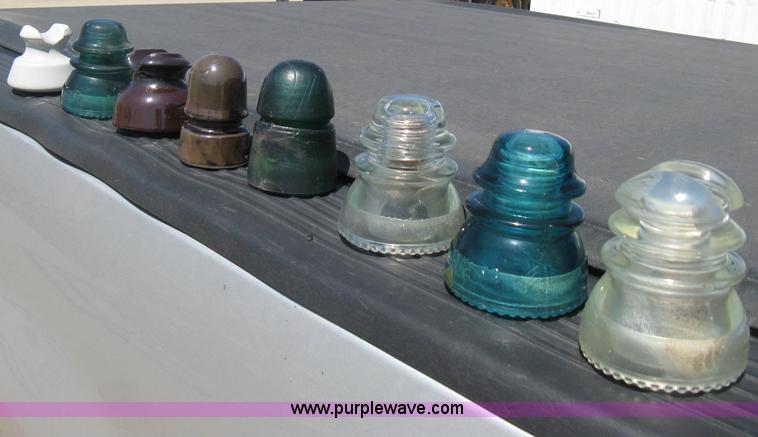 image for item AG9788 (12.5) drums of vintage glass insulators