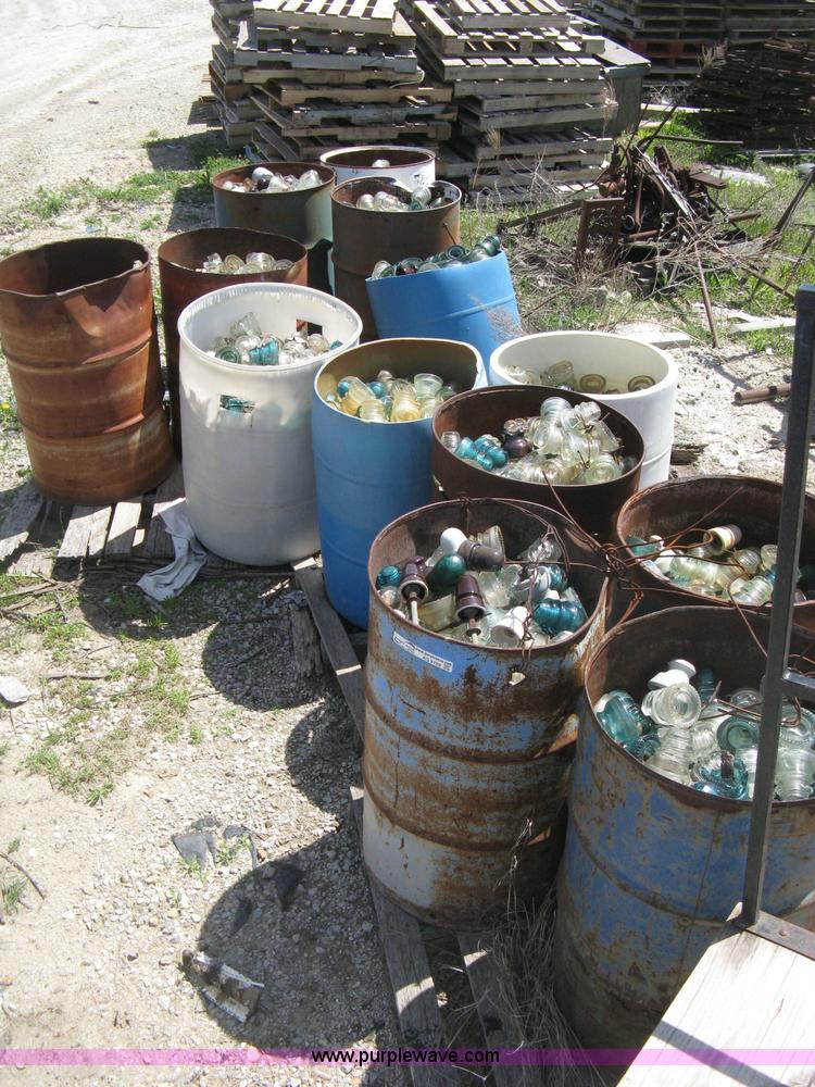 image for item AG9788 (12.5) drums of vintage glass insulators