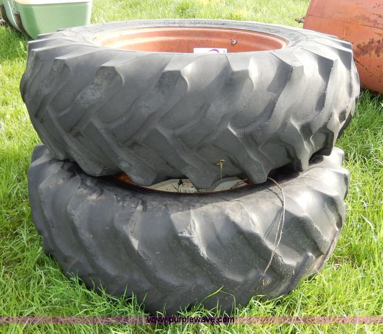 image for item D8154 (2) Goodyear 18.4-34 tires and wheels