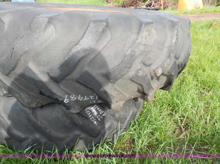 image for item D8154 (2) Goodyear 18.4-34 tires and wheels