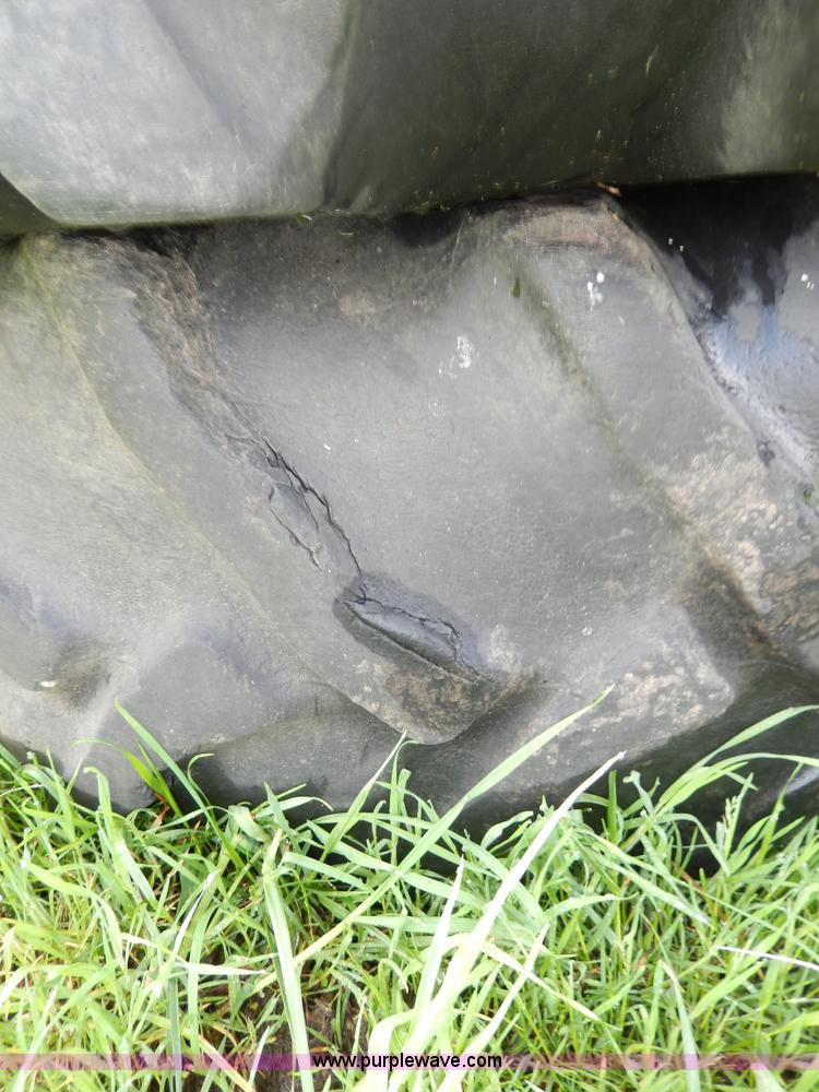 image for item D8154 (2) Goodyear 18.4-34 tires and wheels