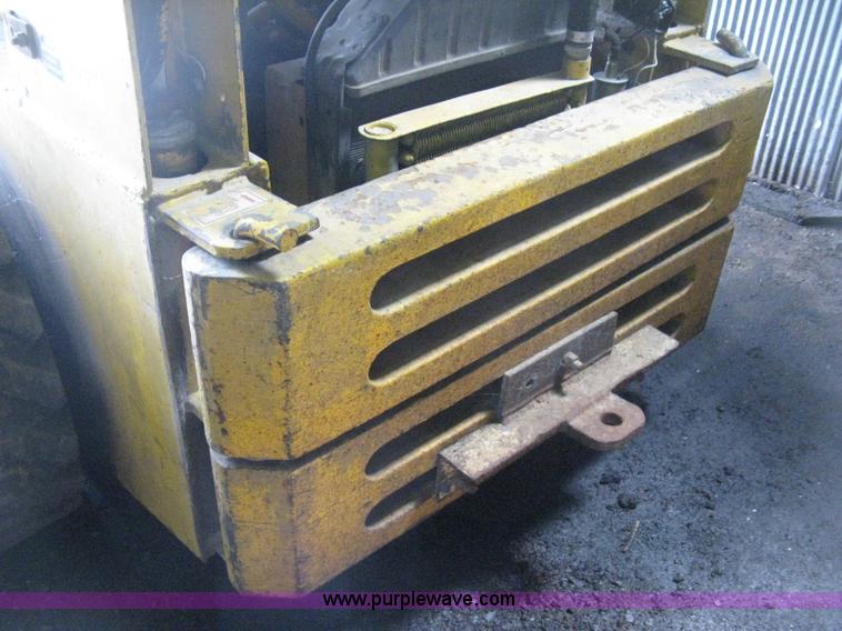 image for item E3453 1978 Ford CL40 skid steer
