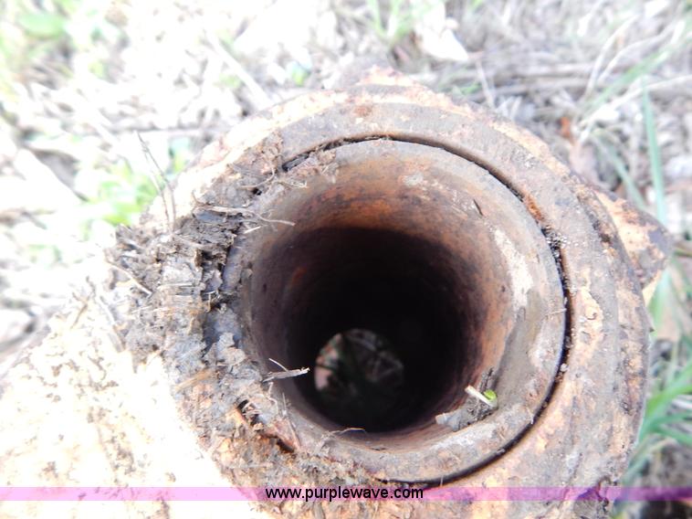 image for item G3140 John Deere 811 skid steer boom