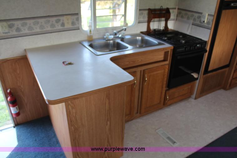 image for item G5339 1999 Dutchman Classic 31' camper