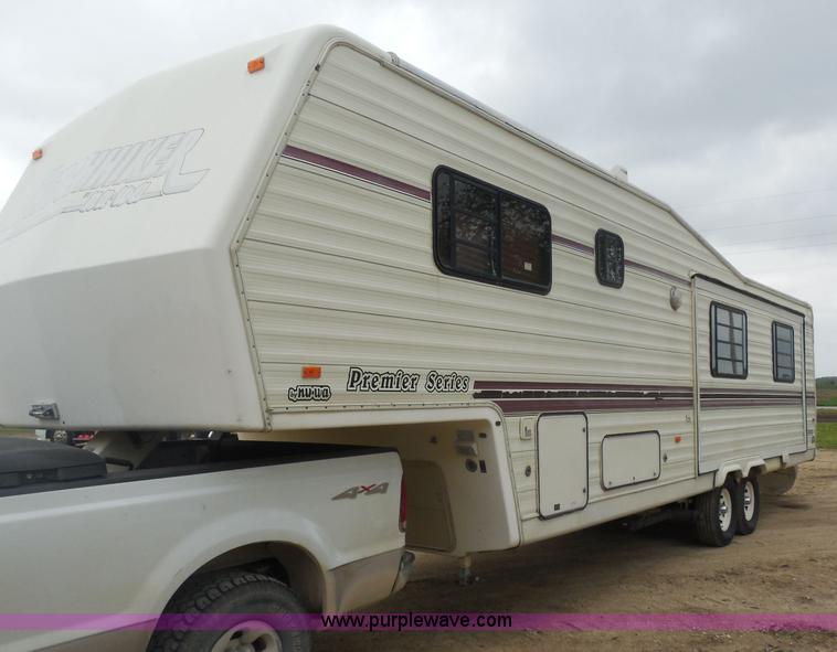 image for item H3182 1992 Nuwa Hitchhiker fifth wheel camper