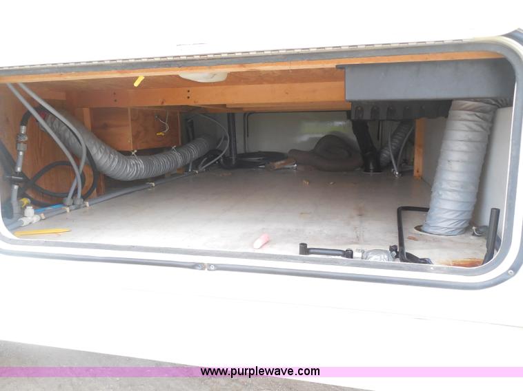 image for item H3182 1992 Nuwa Hitchhiker fifth wheel camper