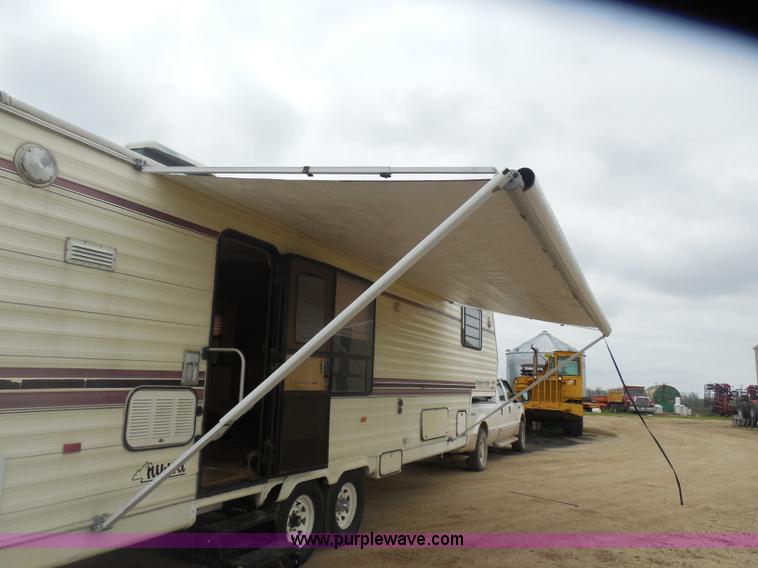 image for item H3182 1992 Nuwa Hitchhiker fifth wheel camper