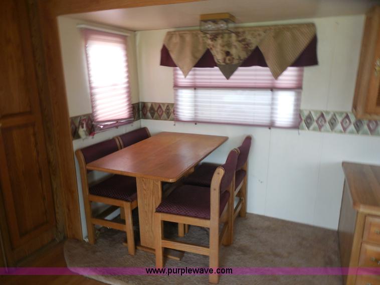 image for item H3182 1992 Nuwa Hitchhiker fifth wheel camper