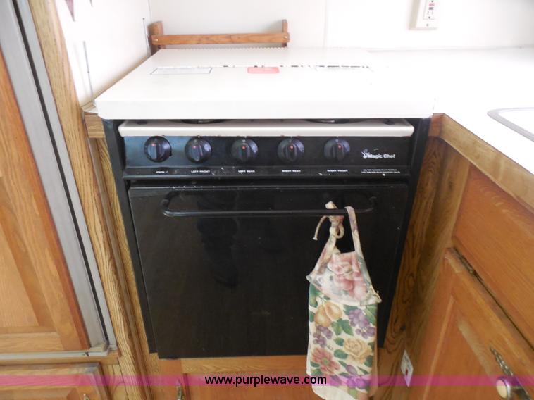 image for item H3182 1992 Nuwa Hitchhiker fifth wheel camper