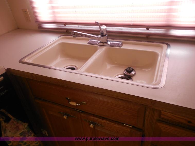 image for item H3182 1992 Nuwa Hitchhiker fifth wheel camper