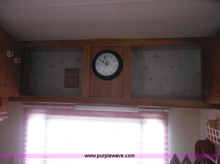 image for item H3182 1992 Nuwa Hitchhiker fifth wheel camper