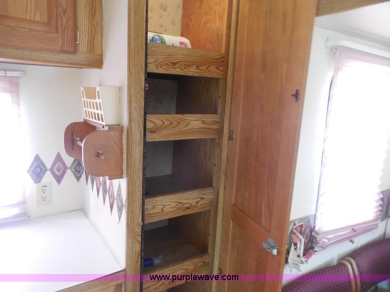 image for item H3182 1992 Nuwa Hitchhiker fifth wheel camper