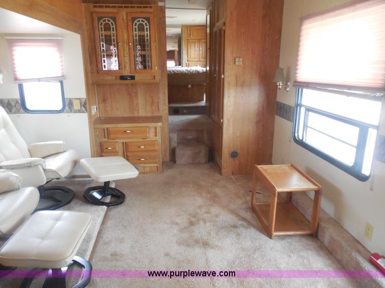image for item H3182 1992 Nuwa Hitchhiker fifth wheel camper