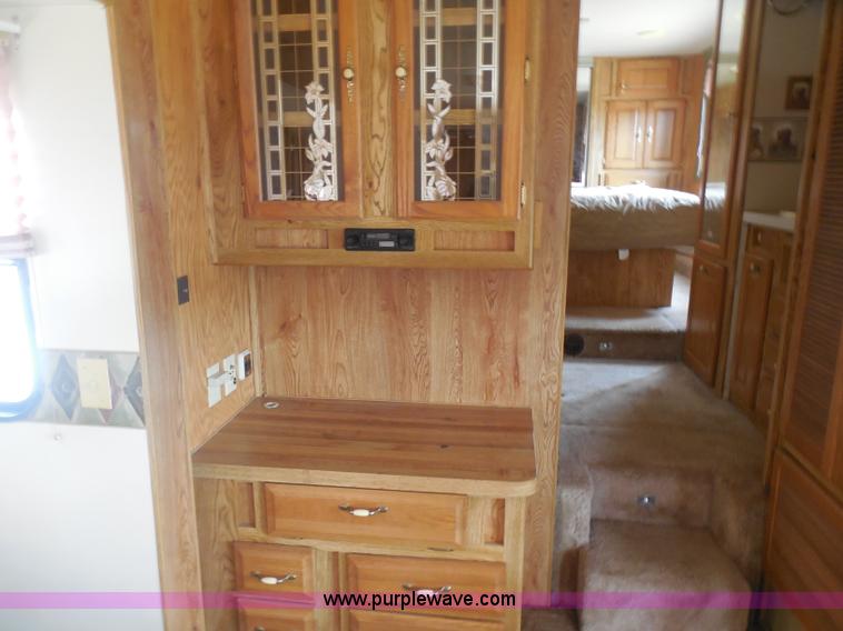 image for item H3182 1992 Nuwa Hitchhiker fifth wheel camper