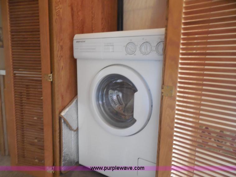 image for item H3182 1992 Nuwa Hitchhiker fifth wheel camper