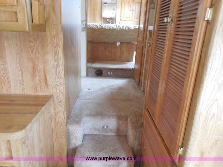 image for item H3182 1992 Nuwa Hitchhiker fifth wheel camper