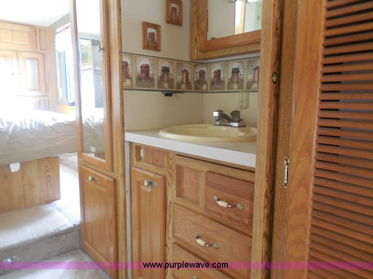 image for item H3182 1992 Nuwa Hitchhiker fifth wheel camper