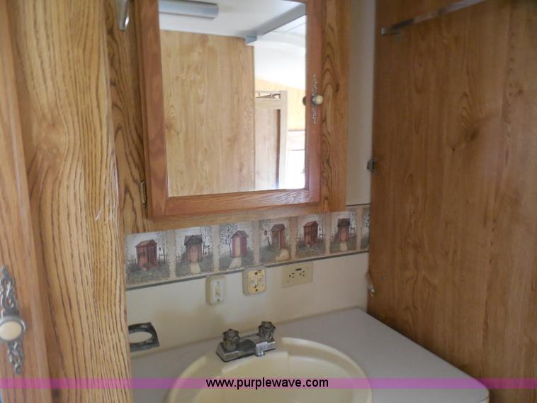 image for item H3182 1992 Nuwa Hitchhiker fifth wheel camper