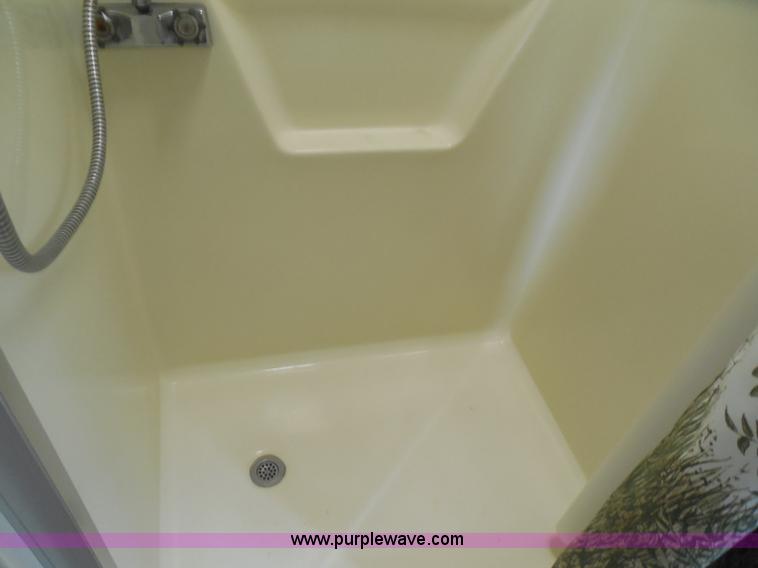 image for item H3182 1992 Nuwa Hitchhiker fifth wheel camper