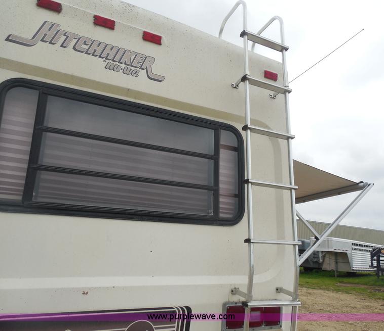 image for item H3182 1992 Nuwa Hitchhiker fifth wheel camper