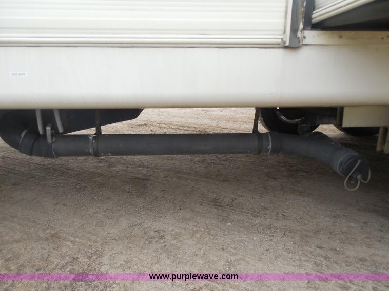 image for item H3182 1992 Nuwa Hitchhiker fifth wheel camper