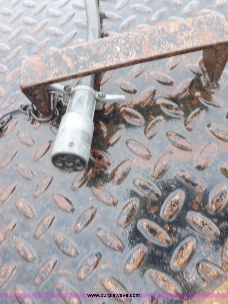 image for item H7215 2002 Neal tandem axle tilt deck trailer