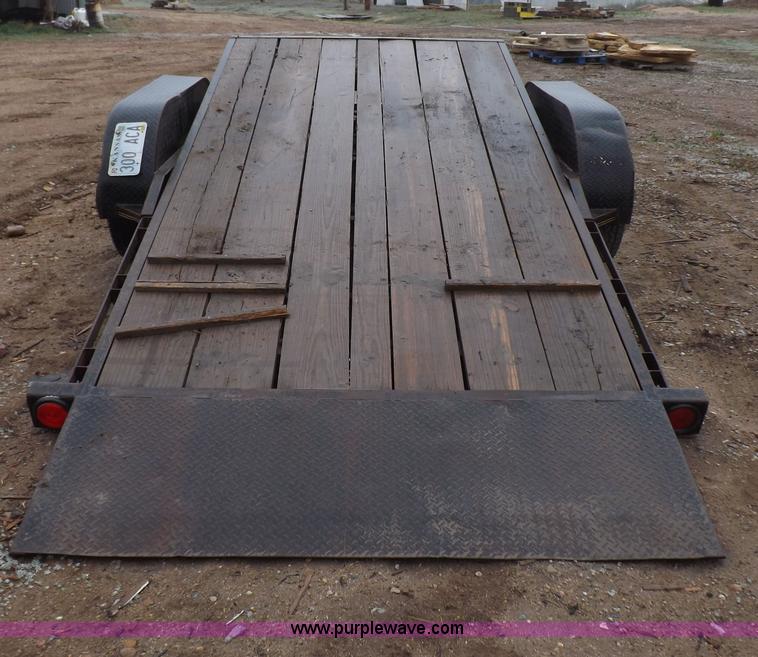 image for item H7215 2002 Neal tandem axle tilt deck trailer