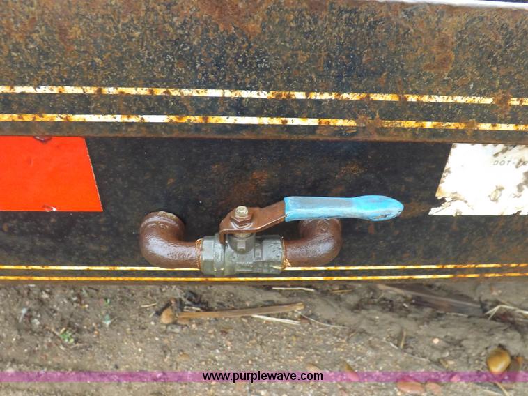 image for item H7215 2002 Neal tandem axle tilt deck trailer