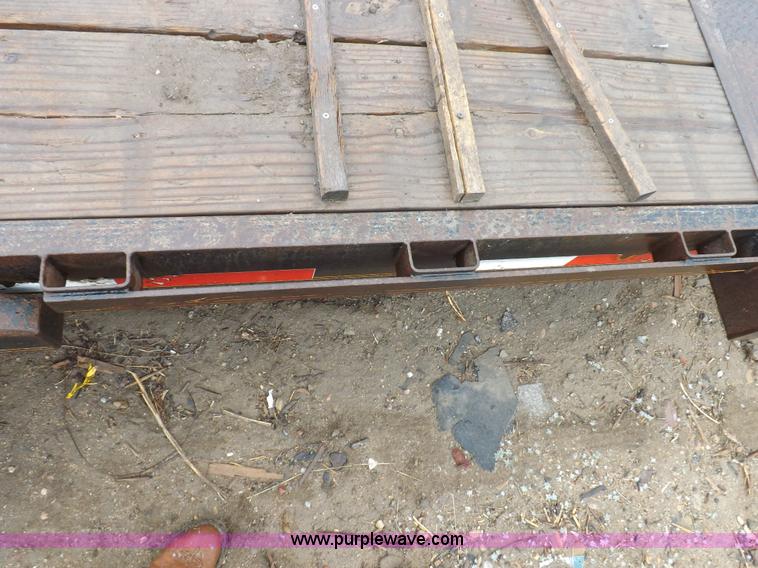 image for item H7215 2002 Neal tandem axle tilt deck trailer