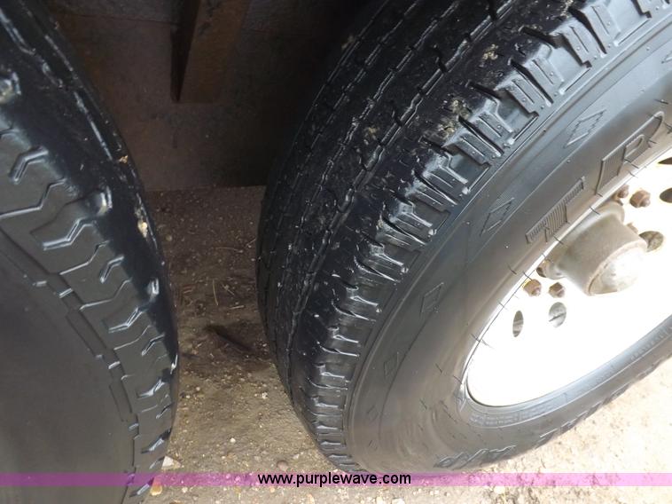 image for item H7215 2002 Neal tandem axle tilt deck trailer