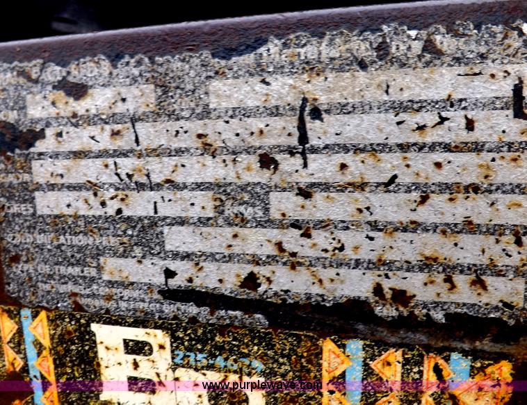 image for item H7215 2002 Neal tandem axle tilt deck trailer