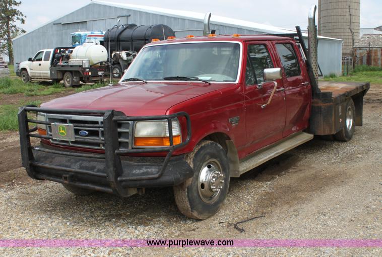 image for item H7500 1997 Ford F350 XLT Crew Cab flatbed pickup truck