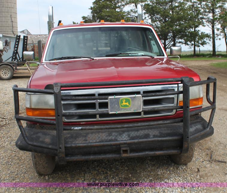 image for item H7500 1997 Ford F350 XLT Crew Cab flatbed pickup truck